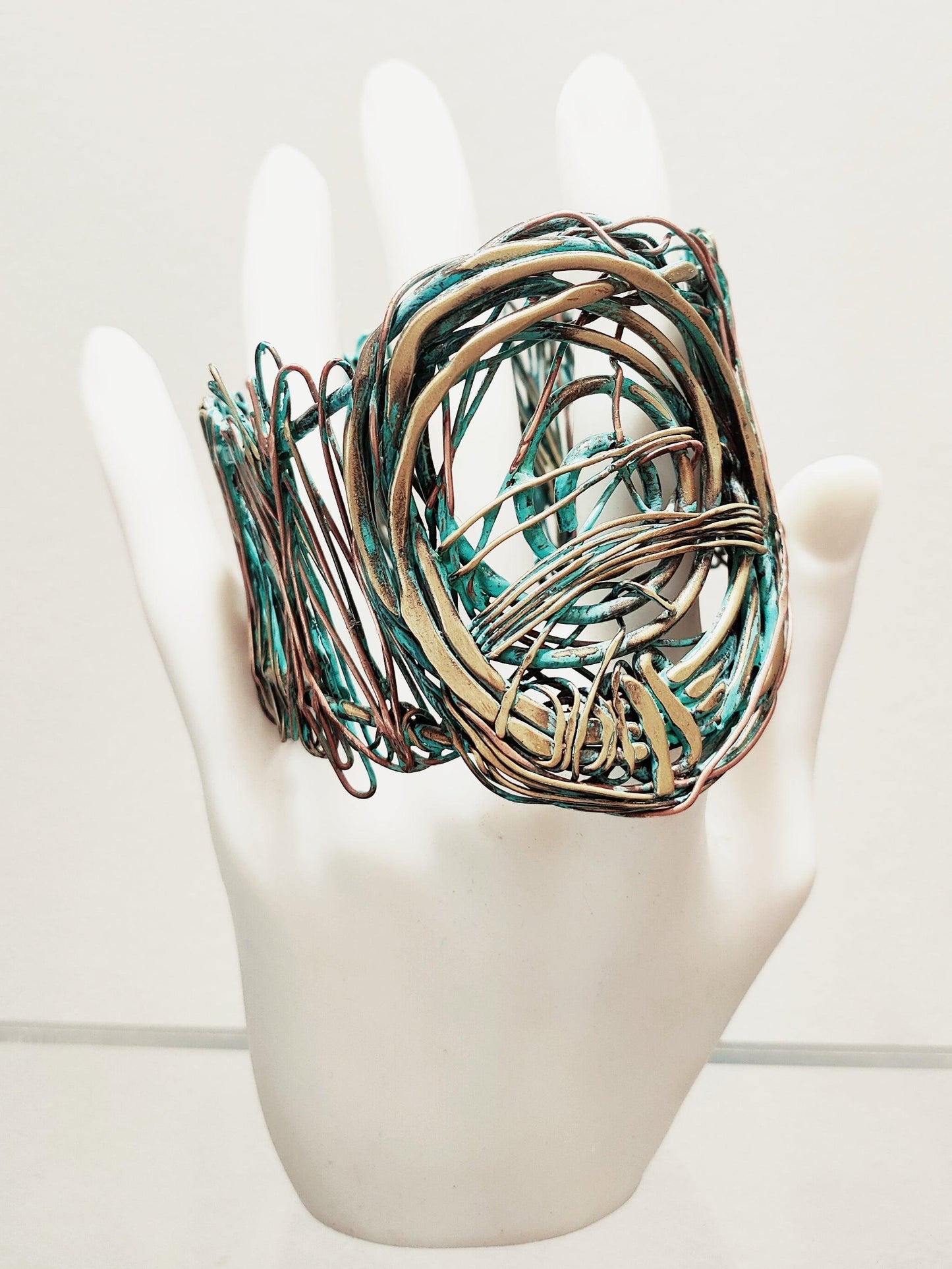 Unique bracelet with green patina