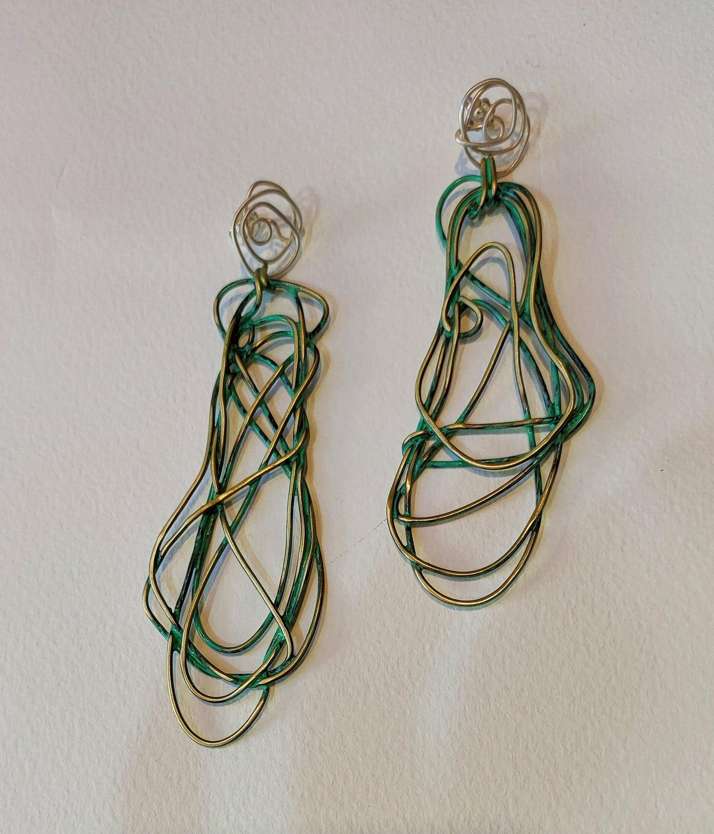 Bronze earrings with green and silver patina