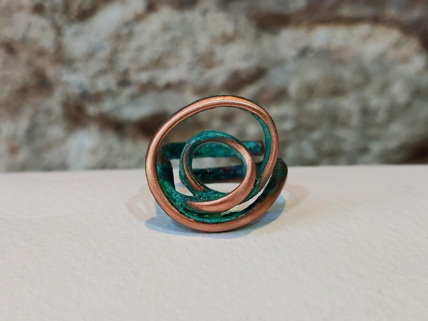 Copper ring with green patina