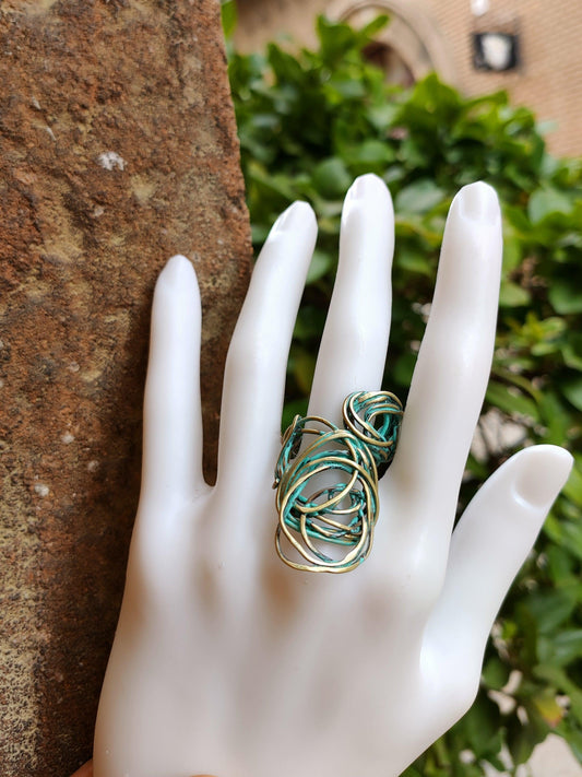 Single ring in bronze and copper with green patina